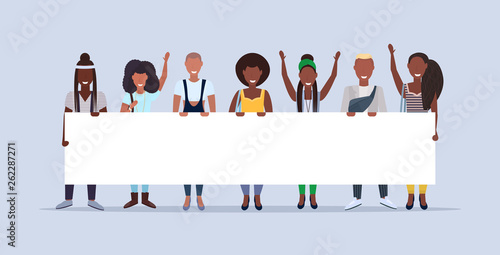 happy men women standing together holding empty placard sign board demonstration concept smiling african american people male female cartoon characters full length horizontal