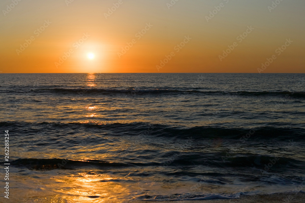 Beautiful sunset over the sea in Tuscany, Italy Beautiful sunset over the sea in Tuscany, Italy