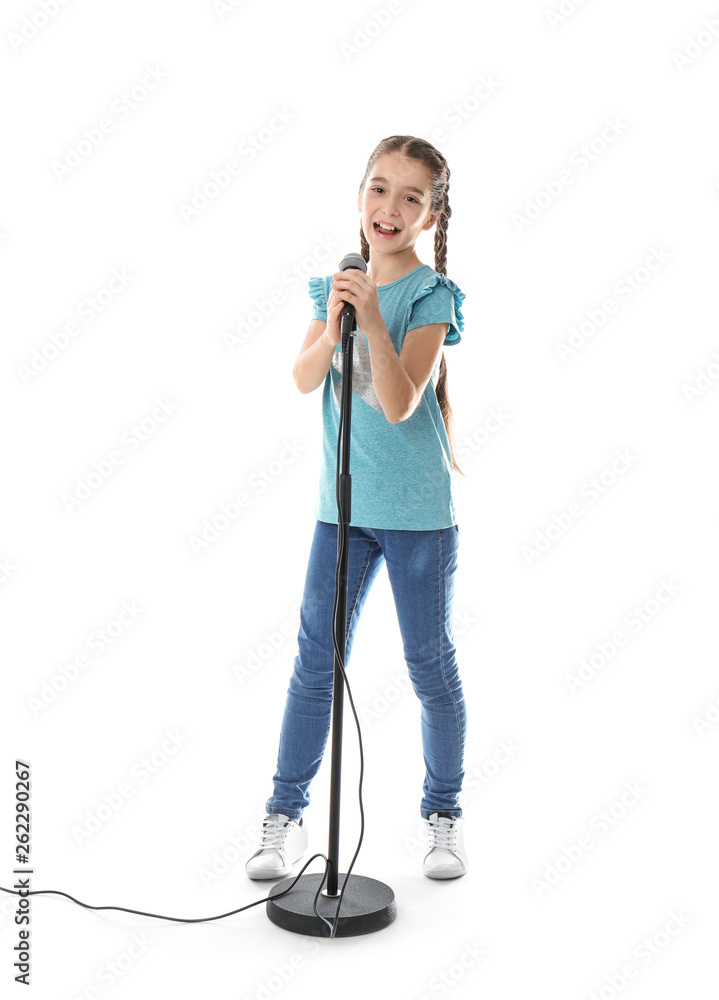 Cute girl singing in microphone on white background