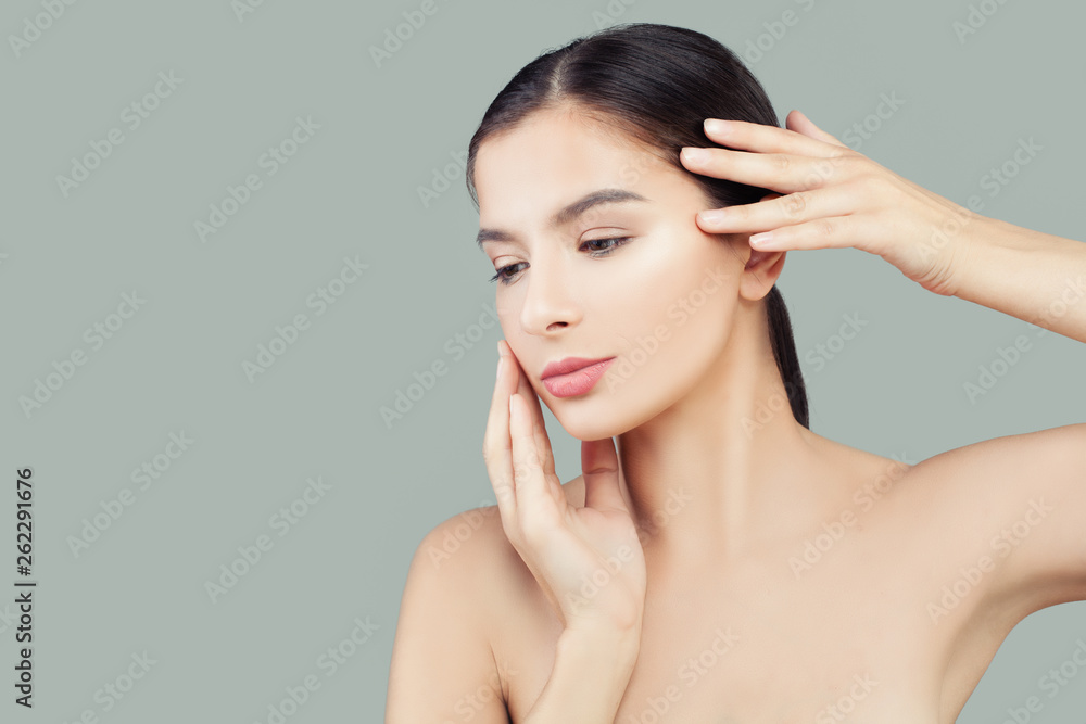Beautiful woman spa model with healthy clear skin. Facial treatment and skin care concept Beautiful woman spa model with healthy clear skin. Facial treatment and skin care concept