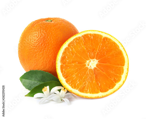 Ripe oranges, leaves and flowers on white background. Citrus fruit