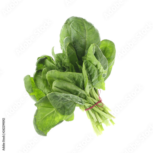 Bundle of fresh spinach isolated on white