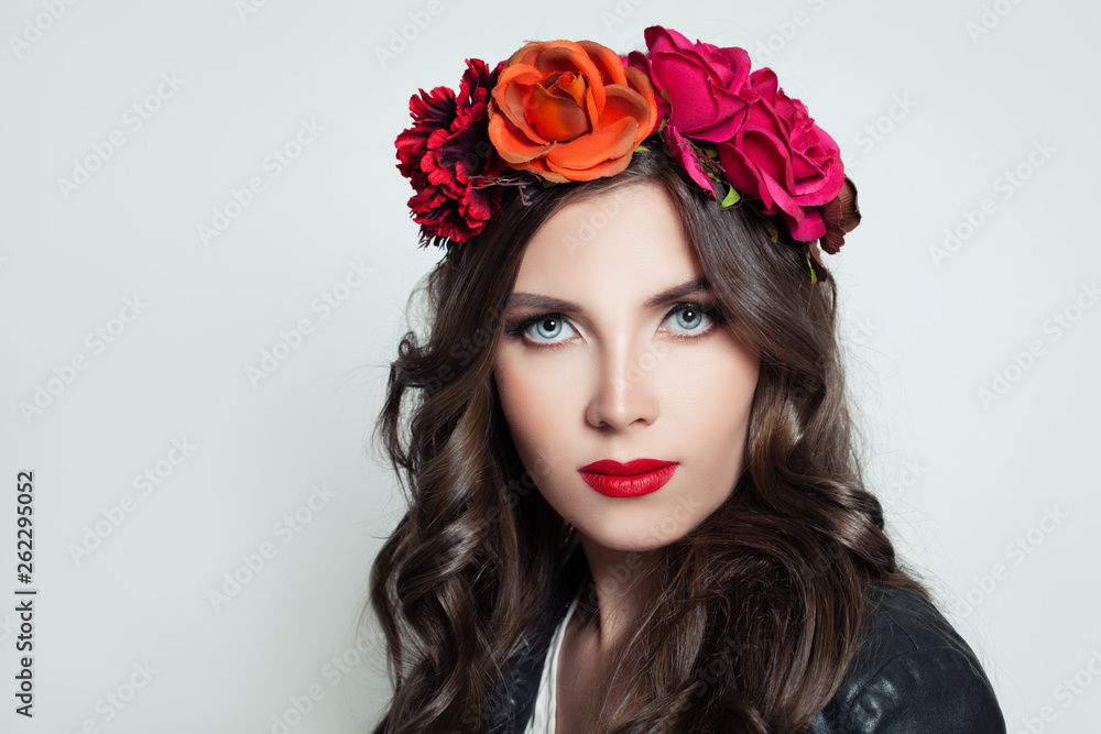 Stylish woman with red lips makeup. Girl in flower crown portrait