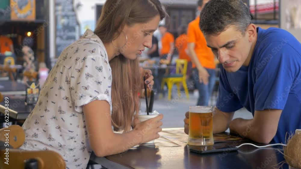 Beautiful couple having drinks on a date Beautiful couple having drinks on a date