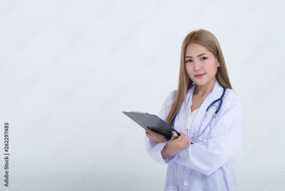 Portrait of young Female doctor with stethoscope on white background,Asian woman,Thailand people,She holding file in hand Portrait of young Female doctor with stethoscope on white background,Asian woman,Thailand people,She holding file in hand