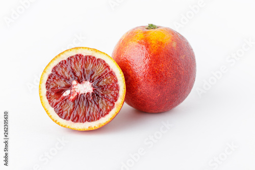 Isolated oranges. Fresh ripe red oranges on white background. Healthy orange fruits background.