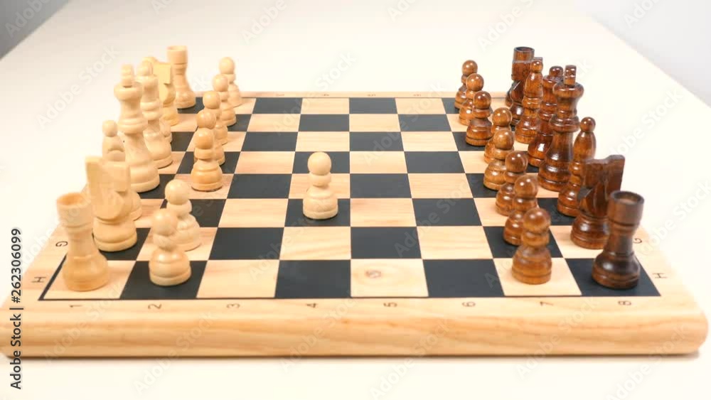 Woman playing chess with herself Woman playing chess with herself