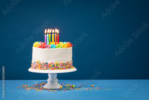 Colorful Birthday Cake over Blue