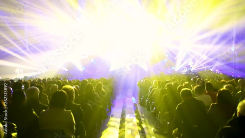 Wallpaper Mural  yellow and blue light show at the musical concert in a sports hall with many people enjoying themselves Torontodigital.ca
