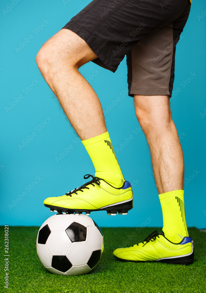 Soccer player with ball on the green grass. Soccer player with ball on the green grass.