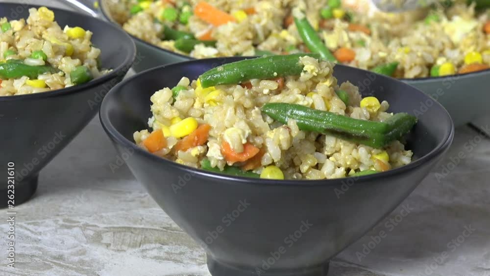 Serving fried rice closeup Serving fried rice closeup