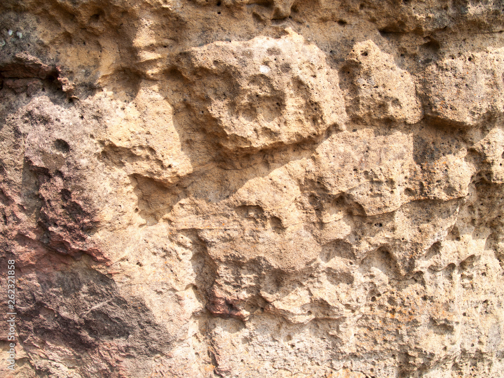 The texture of stone used for background images, Surface of stone brown color