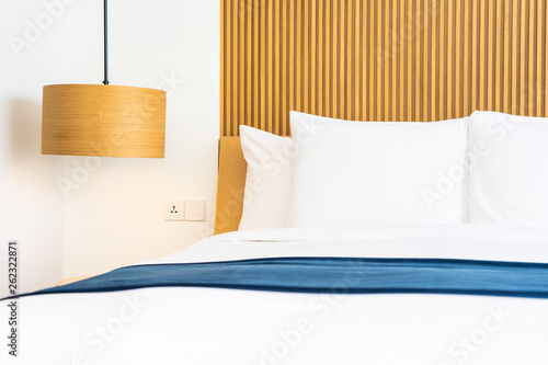 Fototapeta Naklejka Na Ścianę i Meble -  Beautiful comfortable pillow on bed decoration in bedroom