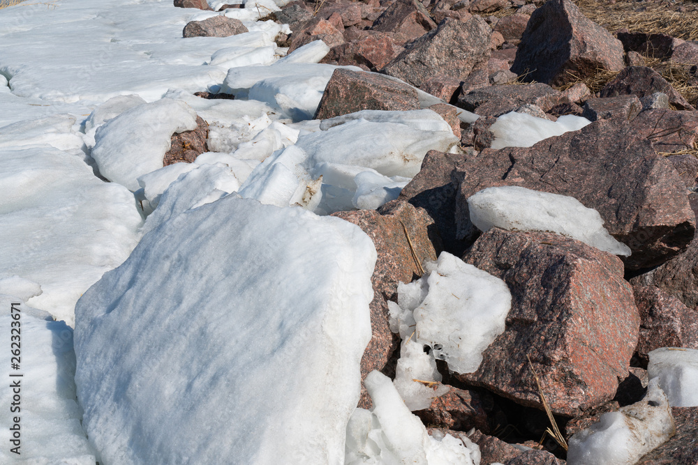 beautiful broken ice background and granite stone top view beautiful broken ice background and granite stone top view
