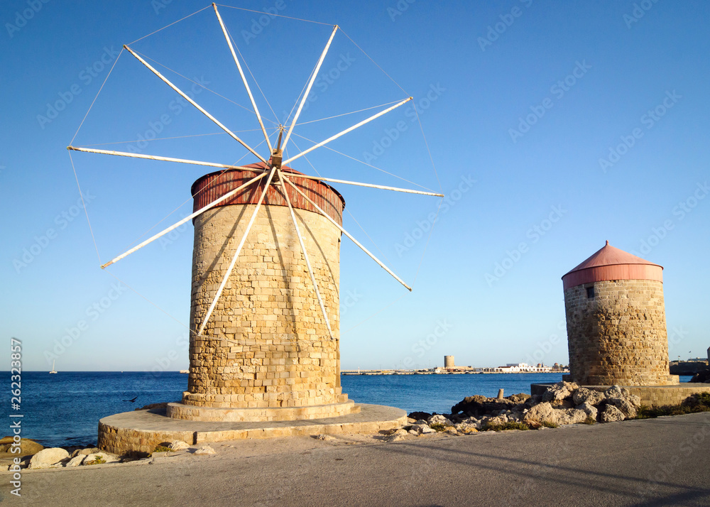 Old windmill in Mandraki port of Rhodes.