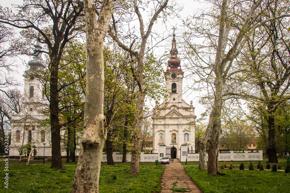 Church in a park in center of small town. Alibunar in Serbia.