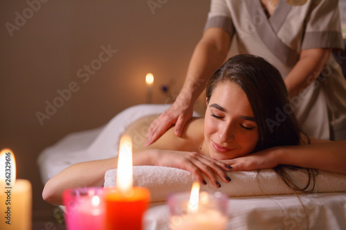 Girl on massage in the spa salon.