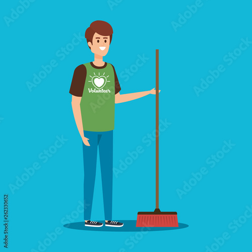 boy volunteer with broom to charity support