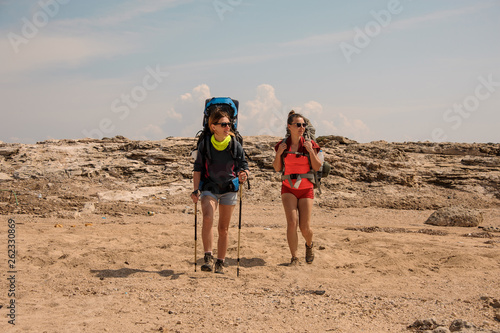 Two young female travellers in the hills