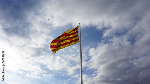 Bandera catalana ondeando en las alturas photo