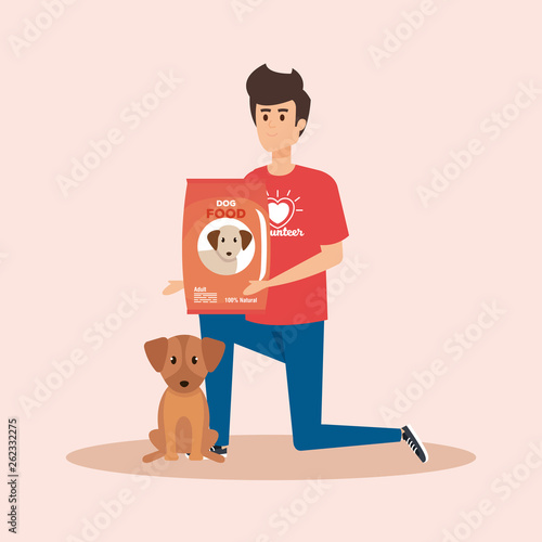 boy volunteer with dog and food donation