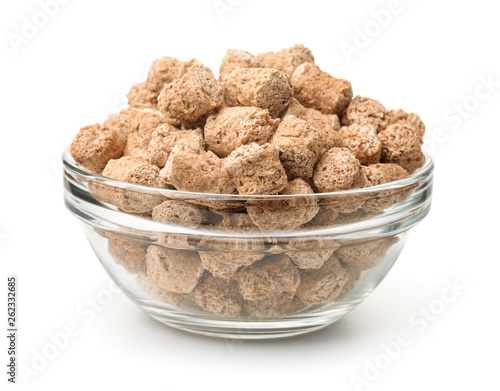 Glass bowl of oats bran pellets