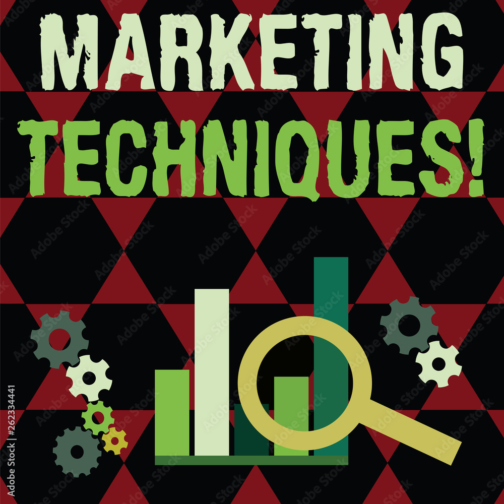 Text sign showing Marketing Techniques. Business photo text business s is overall game plan for reaching showing Magnifying Glass Over Bar Column Chart beside Cog Wheel Gears for Analysis