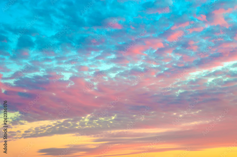 beautiful sky at sunset with clouds of blue red and yellow