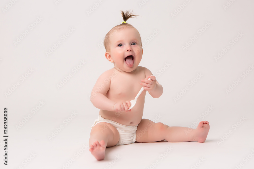 portrait of baby girl smiling 6 months on white background,6 month child baby girl lying happy smiling on a white background portrait of baby girl smiling 6 months on white background,6 month child baby girl lying happy smiling on a white background