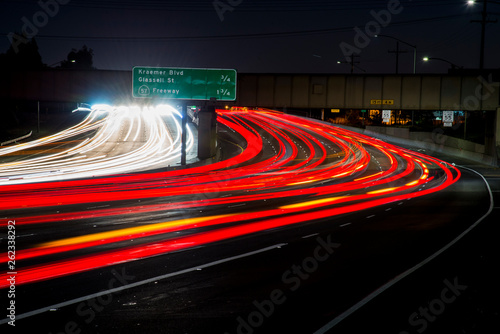 Speeding traffic on the W/B 91 freeway in Anaheim, CA photo