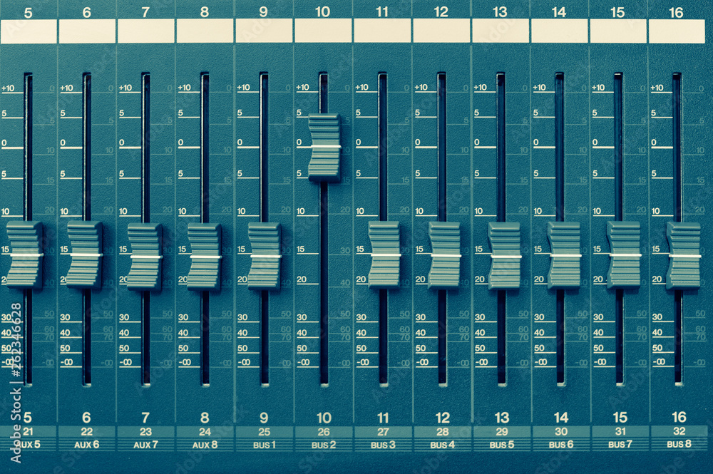 Sound mixer panel with feyder and buttons of control the top view with cyan toning Sound mixer panel with feyder and buttons of control the top view with cyan toning