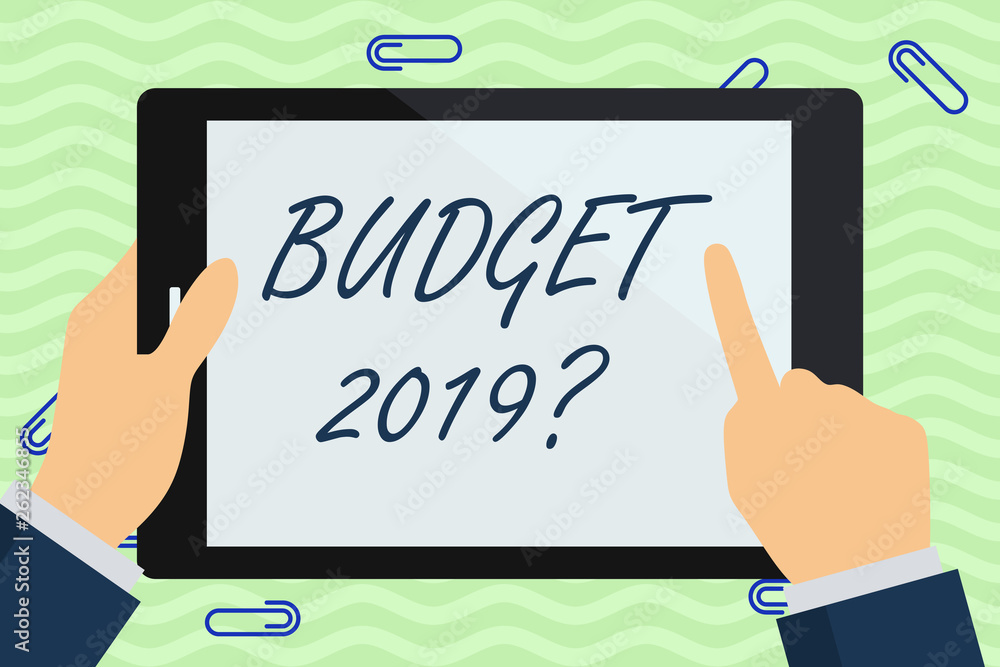 Writing note showing Budget 2019 Question. Business concept for estimate of income and expenditure for next year Businessman Hand Holding and Pointing Colorful Tablet Screen Writing note showing Budget 2019 Question. Business concept for estimate of income and expenditure for next year Businessman Hand Holding and Pointing Colorful Tablet Screen
