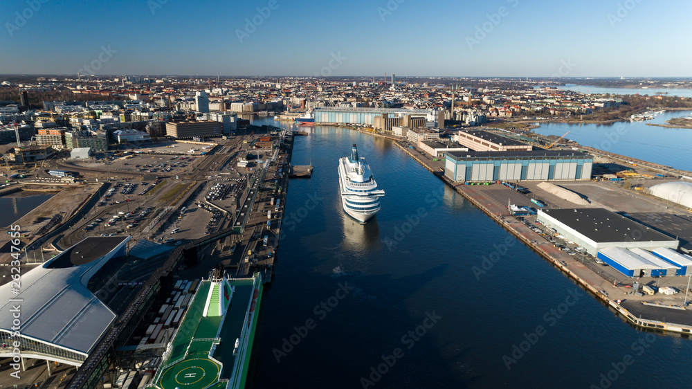Obraz premium Passenger cruise ferry boat depart from port of Helsinki city