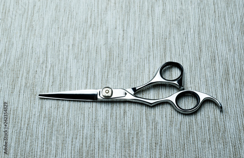 Stylish Professional Barber Scissors; Hairdresser salon concept;Haircut accessories.