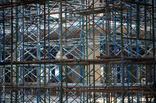 Scaffold. Construction Scaffoldings. It used as the temporary structure to support building structure during construction. © mai111
