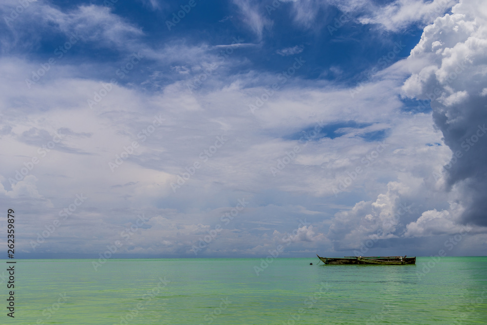 one old housmade wooden boat in the ocean one old housmade wooden boat in the ocean