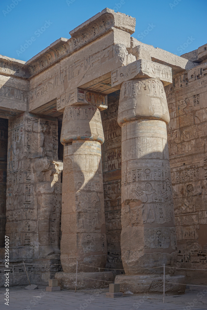 Luxor, Egypt: Corner of the peristyle courtyard at Medinet Habu, New Kingdom mortuary temple of Ramesses III on the West Bank of the Nile River.