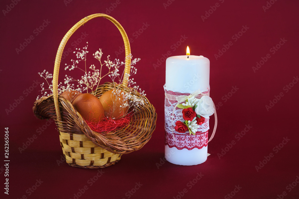 easter basket with burning candle