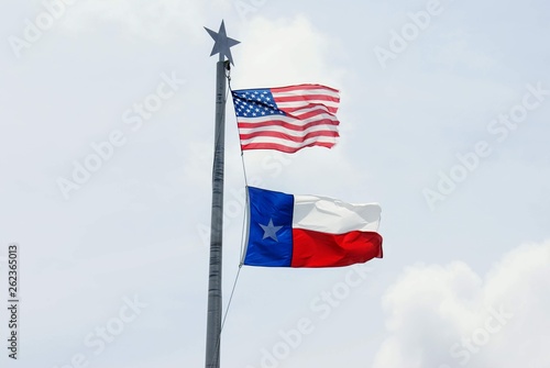 American and Texas Flag Flying