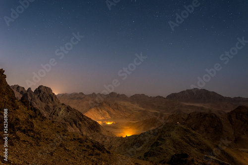 night landscape  bald mountains against a starry sky