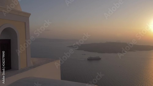 Catholic Church of St. Stylianos at sunset in Fira, Santorini, Greece, Europe photo