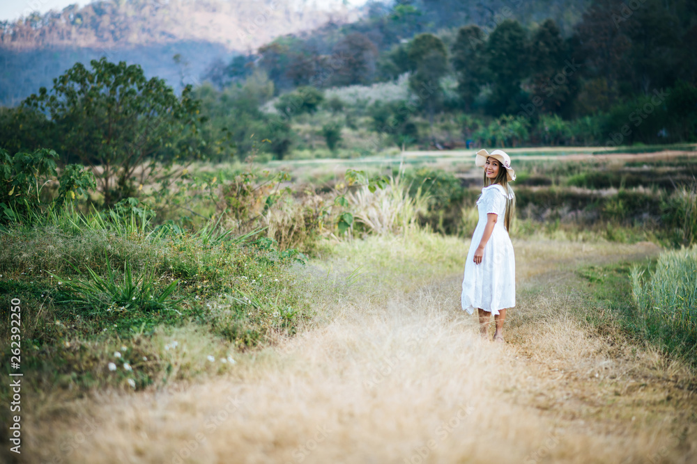 Woman in the hat happiness in the nature Woman in the hat happiness in the nature