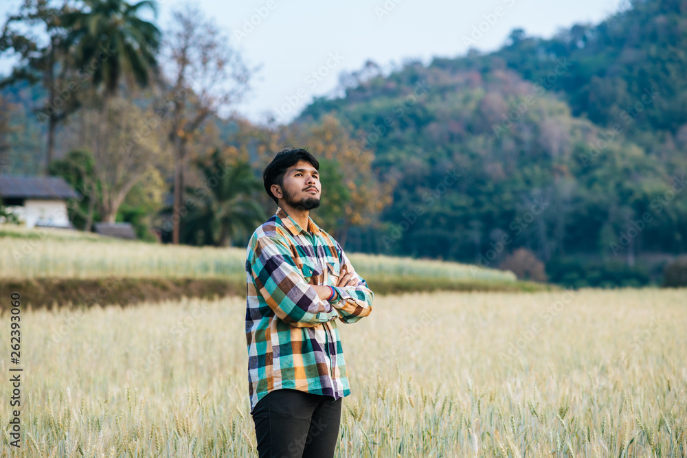 Handsome man farmer with barlay field Handsome man farmer with barlay field