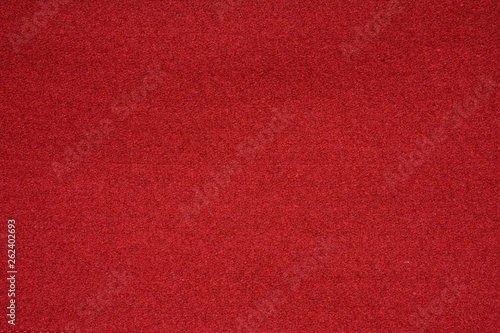 The texture of the knitted red fabric for the background 