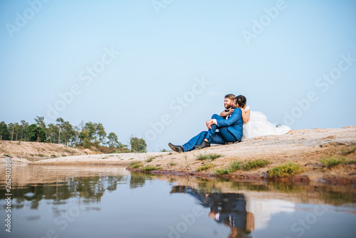 Asian bride and Caucasian groom have romance time and happy together