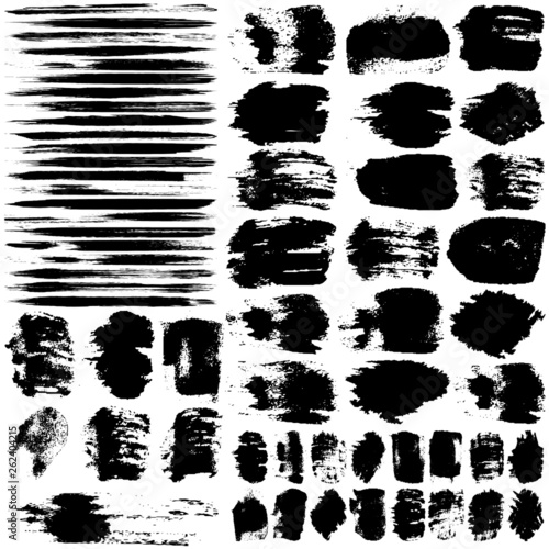 Set of vector strokes with a dry brush. Abstract black spots and strokes isolated on white background. Grunge style templates for text, icons