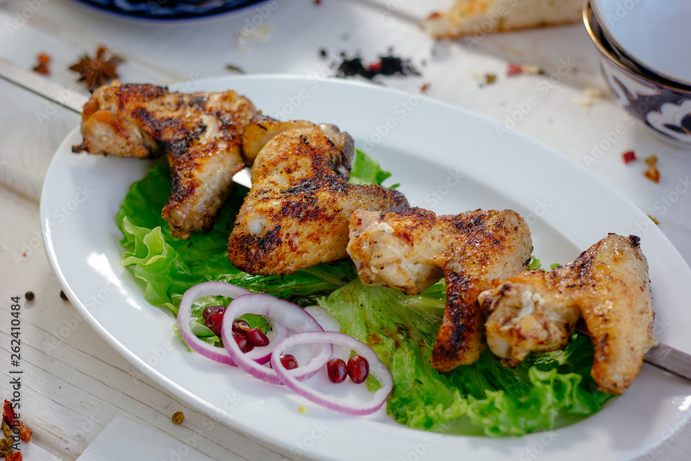 Chiken wings prepared on grill. Chiken wings prepared on grill.