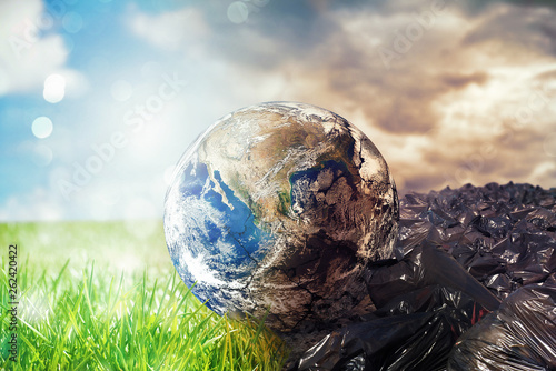 Earth is chancing due to pollution and undifferentiated trash. Save the World. World provided by NASA photo