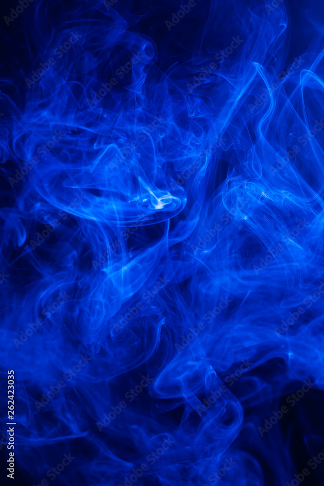 Blue smoke on black background. Blue smoke on black background.