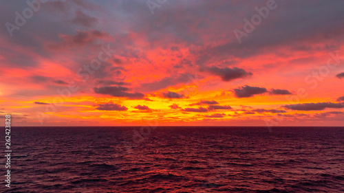 red sunset over the sea © Igor